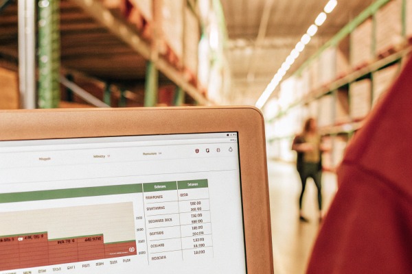 Stock data screen Warehouse computer screen with stock data (ID#2)