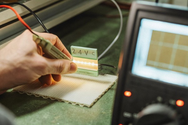 Corroded LED strip showing rust and electrical failure